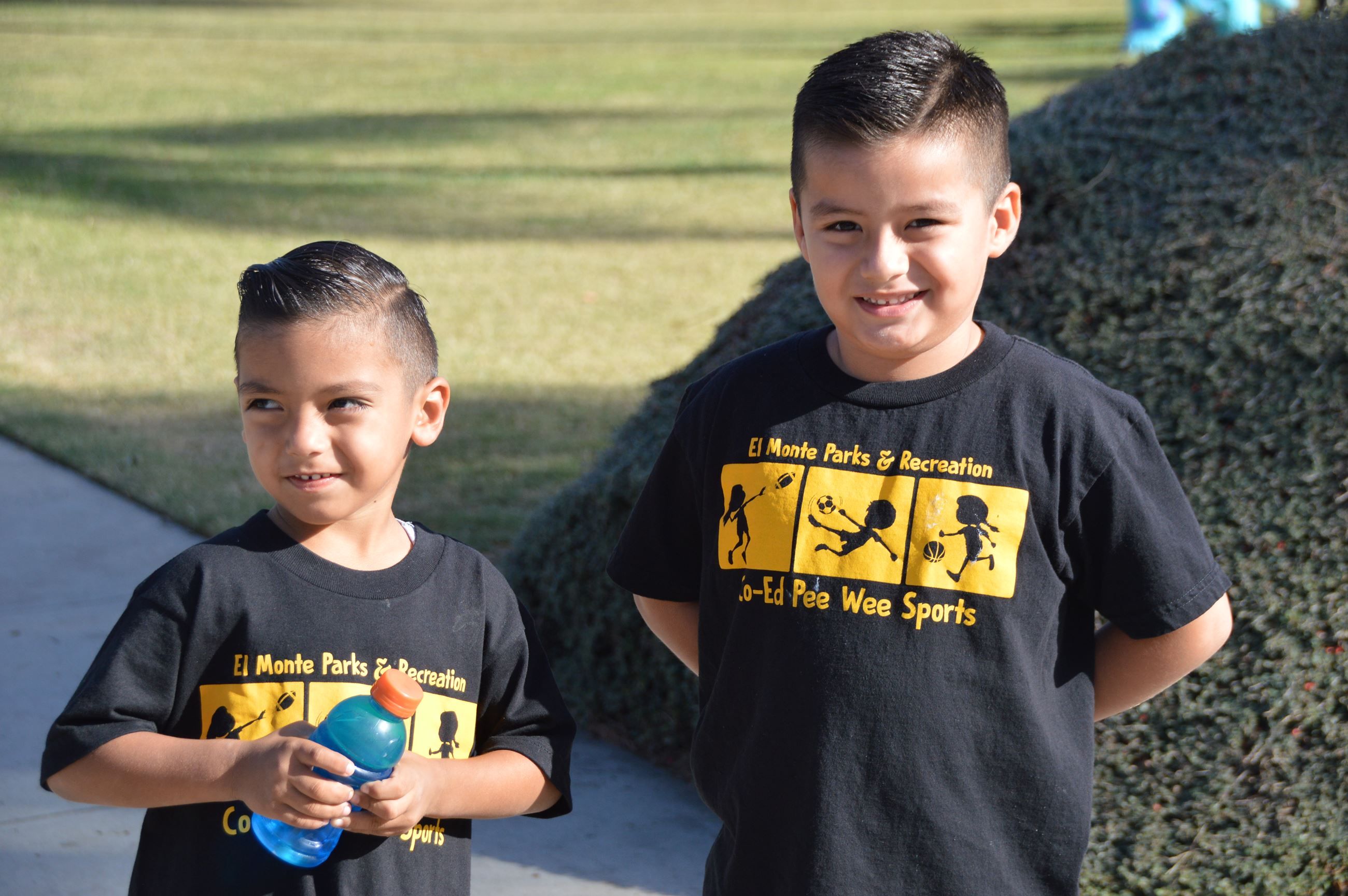 Two Little Boys at Event Wearing the Same Shirt