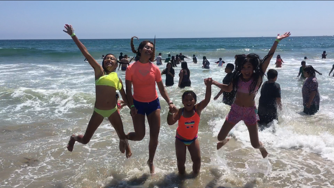 Kids and leader enjoying time at the beach
